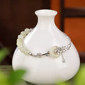 Women's Hetian jade and 925 silver peace buckle bracelet with lotus motif