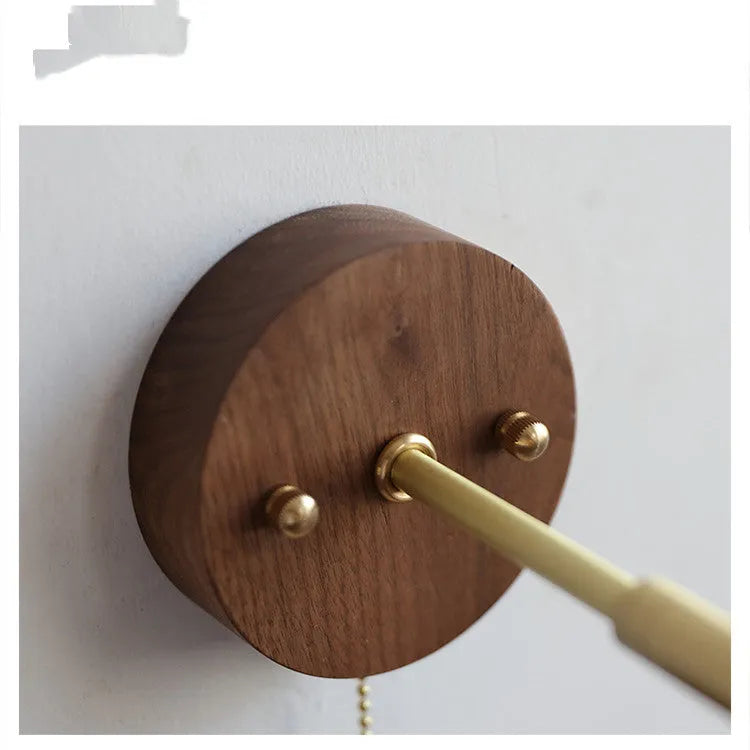 Nordic style wooden wall mounted bedside lamp in a bedroom setting