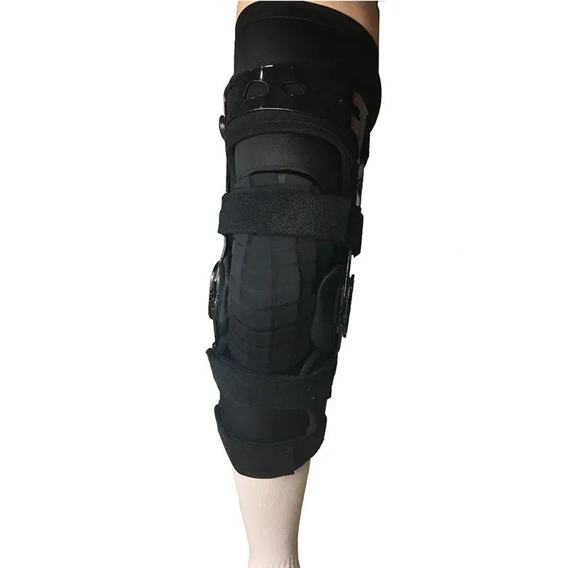 Black anterior ligament knee supporter with adjustable straps and hinge joints shown in size M-R format
