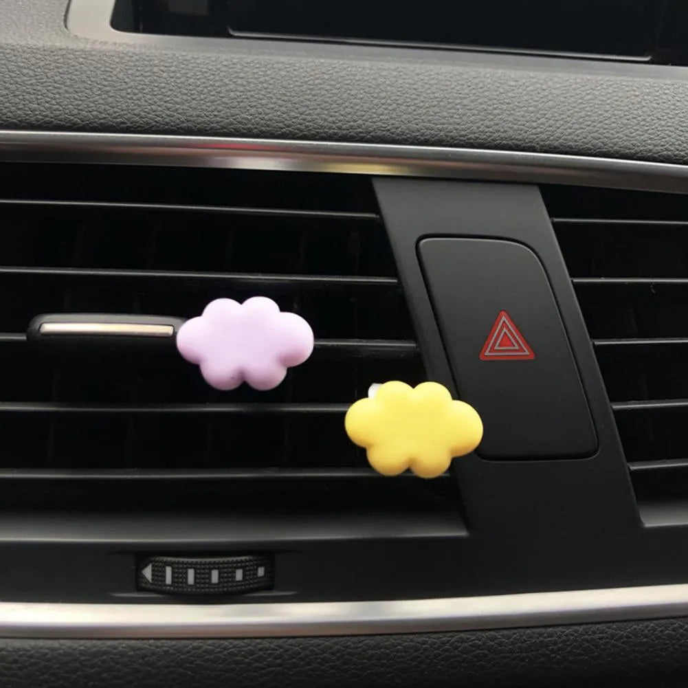 Baiyun cartoon resin car air vent fragrance clip in six colour options.