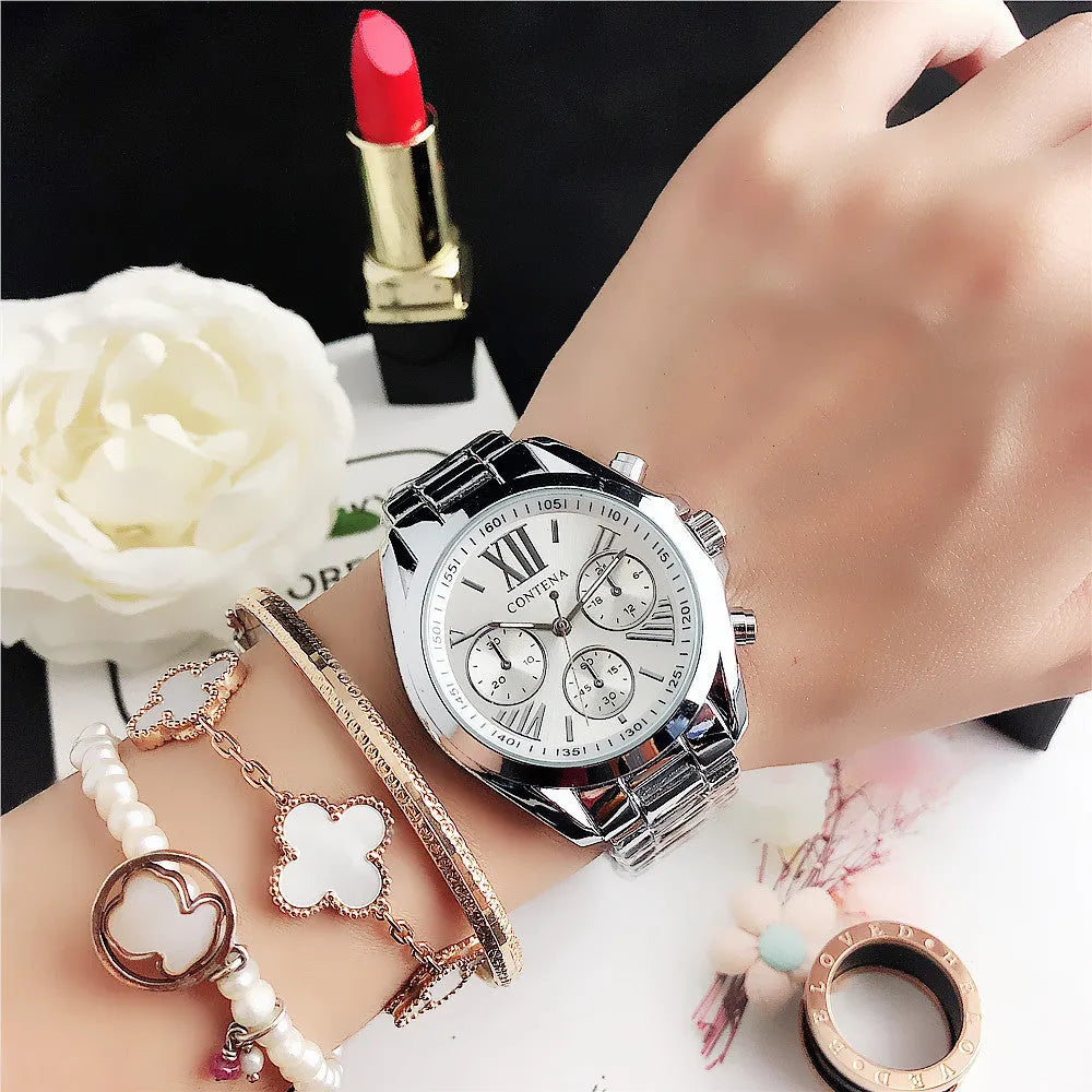 Women's silver rose gold diamond quartz analogue watch with mesh strap on wrist