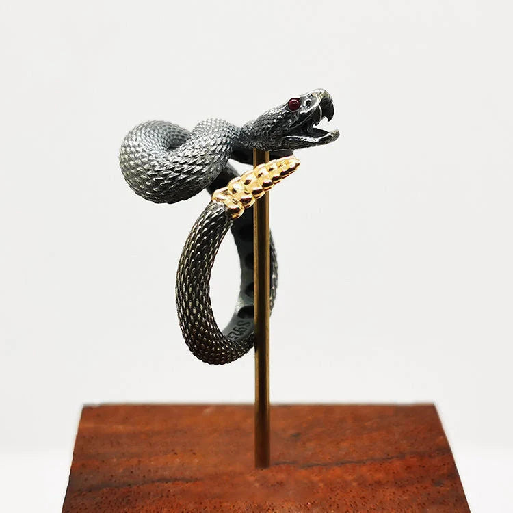 Adjustable copper snake ring in black and white with gold tail options