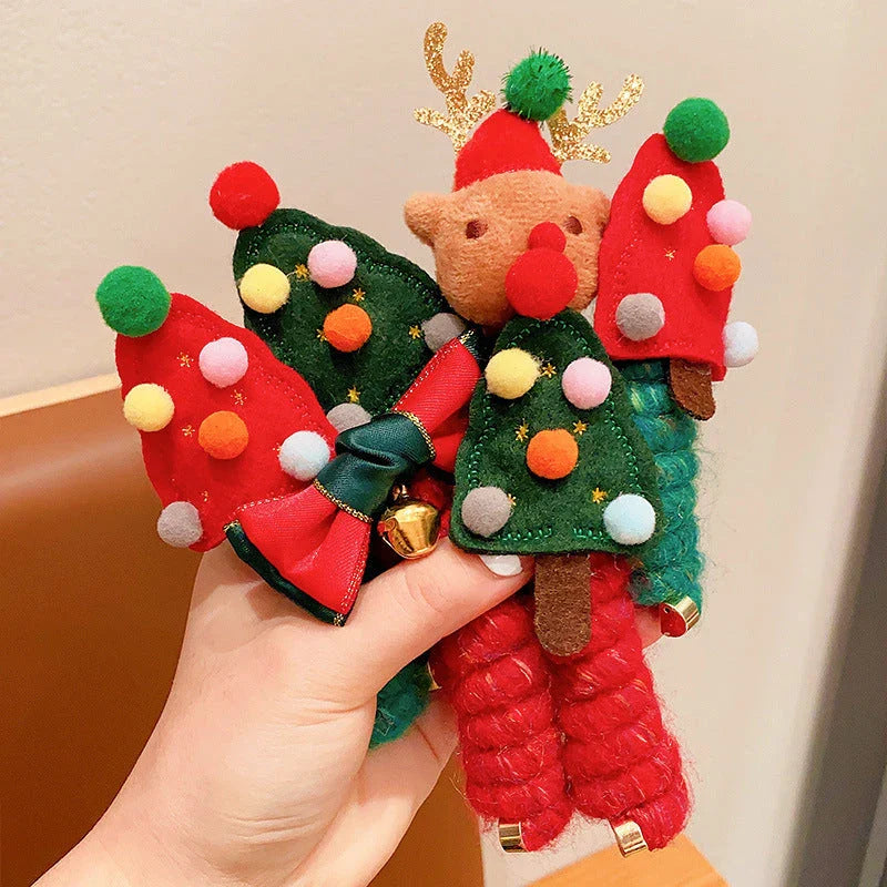 Festive Christmas hair ties for girls in various holiday-themed designs, including red bells, green trees, and khaki deer.