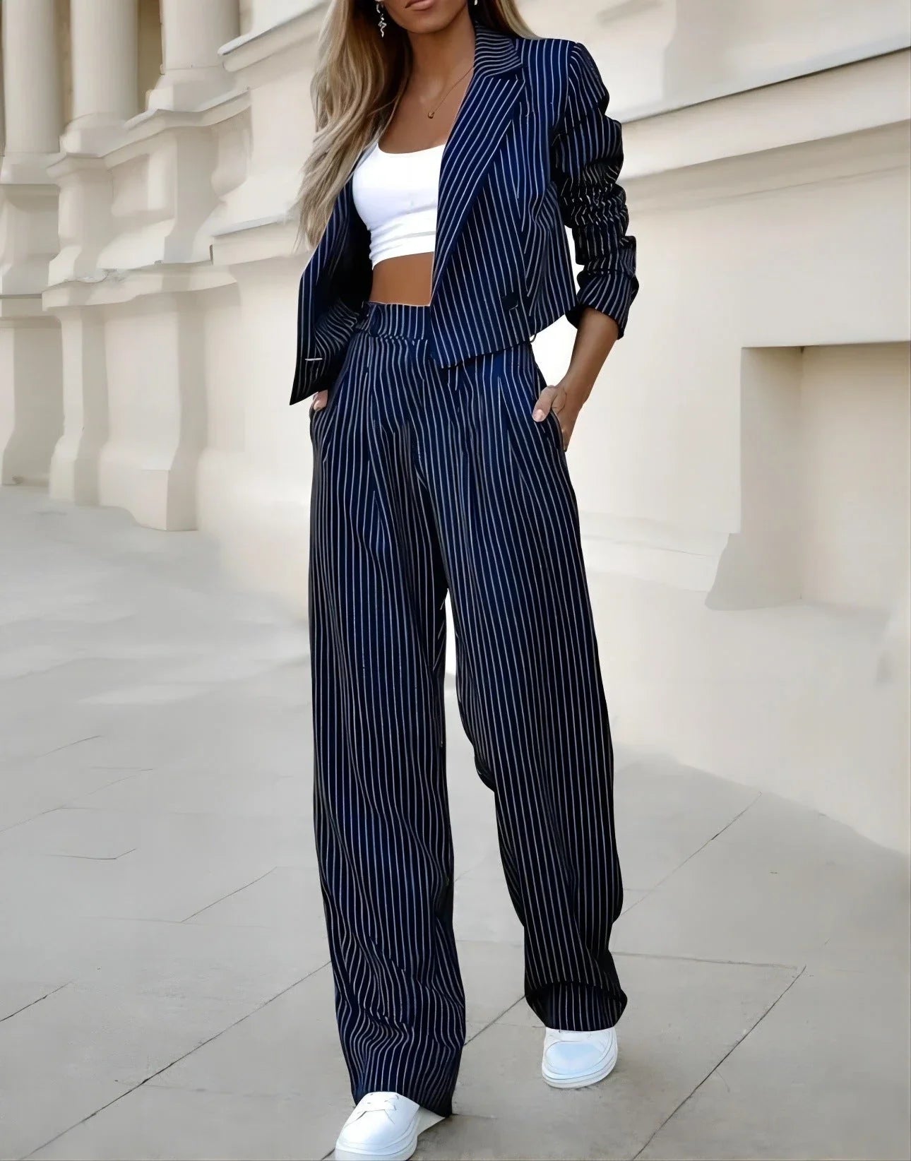 Stylish striped casual suit with cropped top and straight-leg pants in gray, dark blue, and black colors