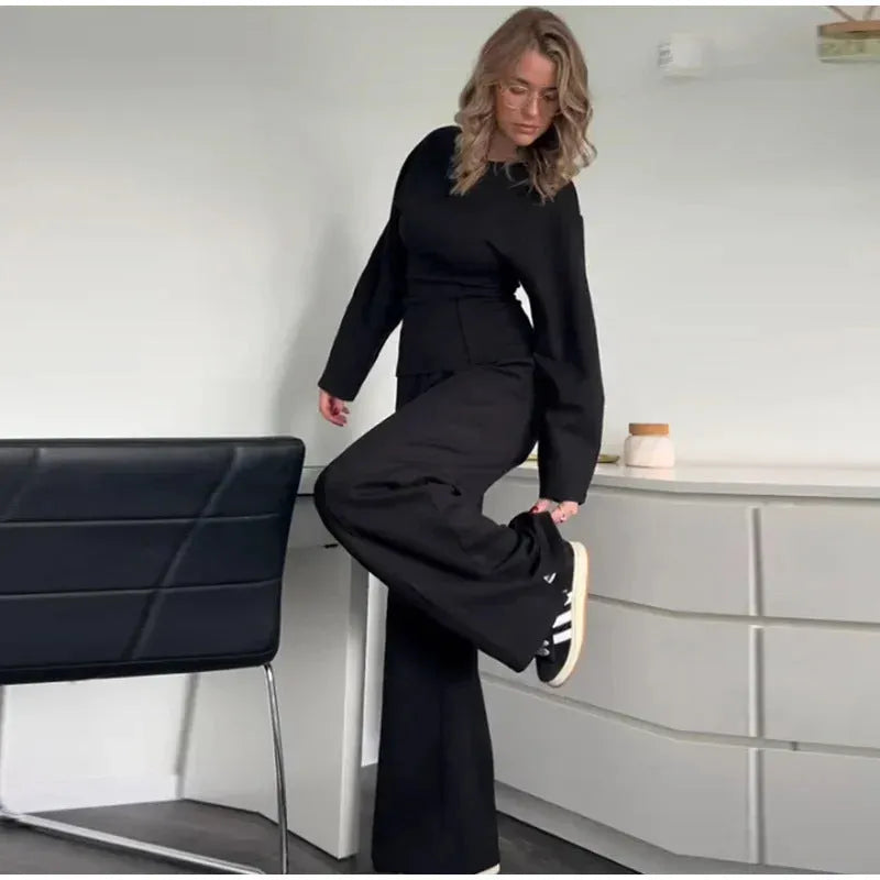 Women's apricot coloured polar fleece suit set featuring a pleated long sleeve top and wide leg trousers