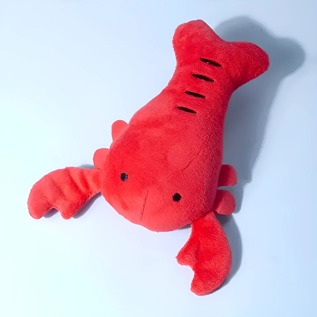 Red lobster stuffed dog toy with flapping tentacles on white background
