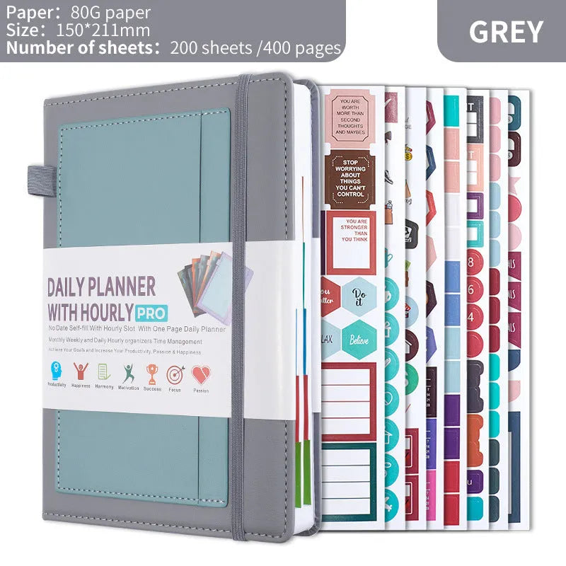 No date journal notebook with elastic strap closure in purple, showing thread binding and thick paper.