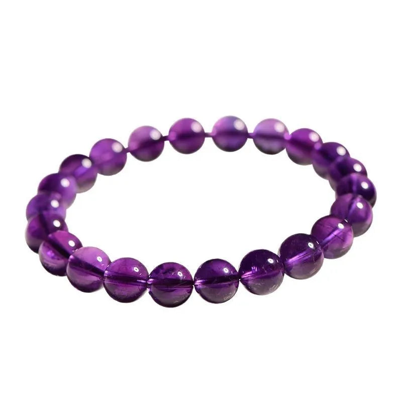 Natural amethyst Uruguay bracelet with scattered polished beads in violet tones, shown in a single circle design.