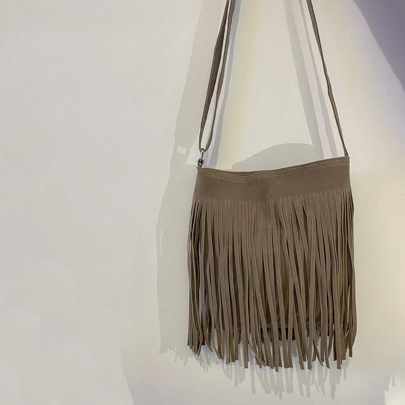 Artistic Tassel Shoulder Bag in various colours showcasing literary style and tassel detail