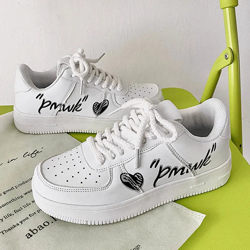 Low cut white PU sports casual shoe for men, lace-up design, solid colour, side view