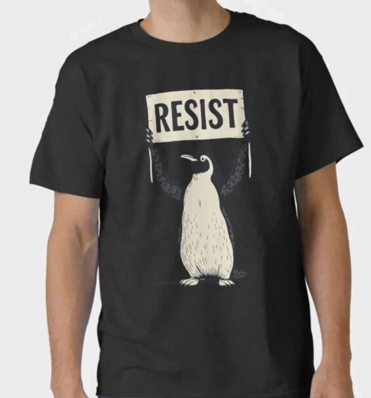 Loose-fit cotton short-sleeve T-shirt in black on a hanger.