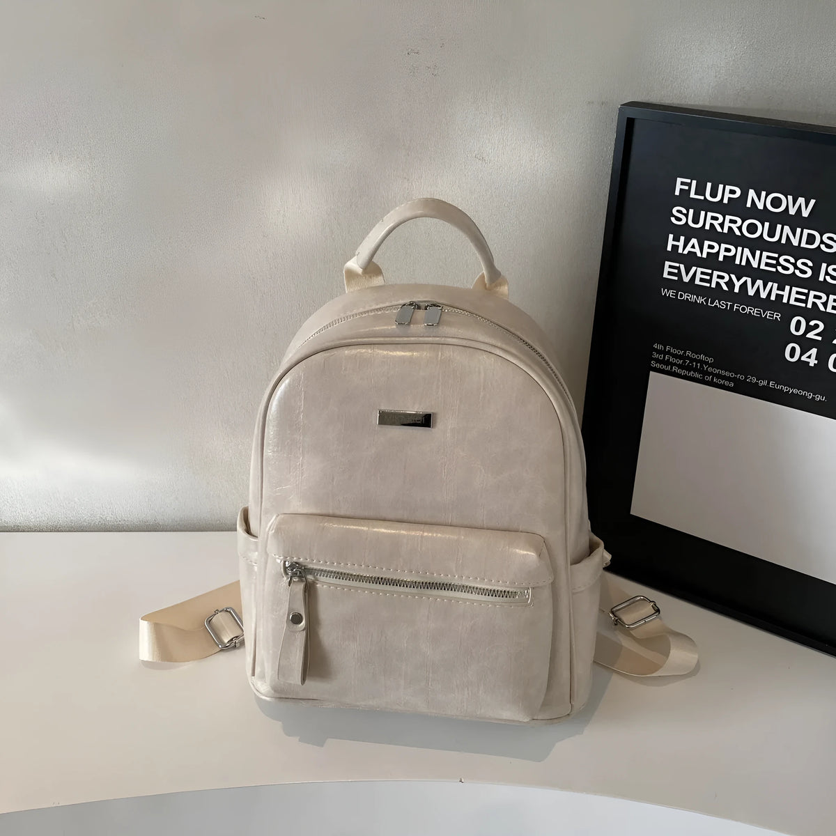 Ladies travel backpack in urban simplicity style, soft PU material, waterproof, with sandwich pocket