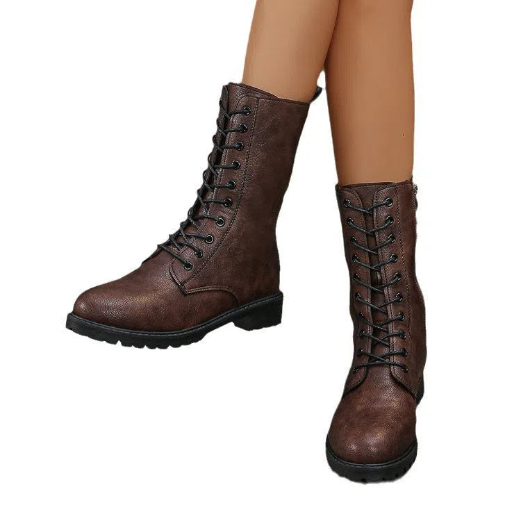 Women's flat mid-calf lace-up boots in brown with artificial PU upper and hollow design detail