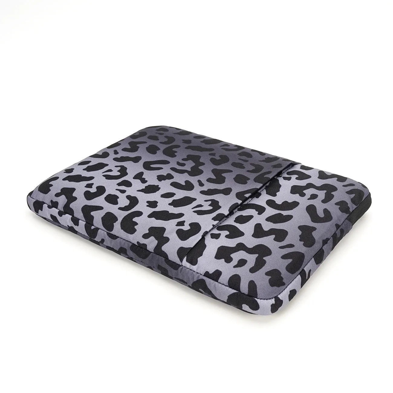Leopard print laptop protective sleeve showing flannel interior and waterproof polyester exterior
