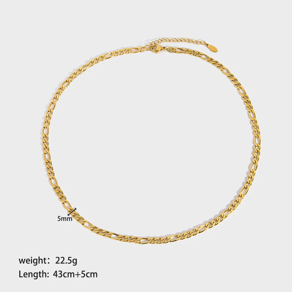 Gold electroplated stainless steel necklace with geometry pendant on white background