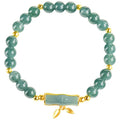Blue water natural jade beads on a sterling silver high-rise bracelet for women.