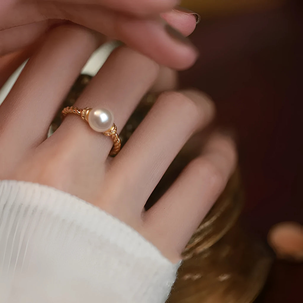 Adjustable antique twist pearl ring in copper with geometric shape and gold silver finish options.