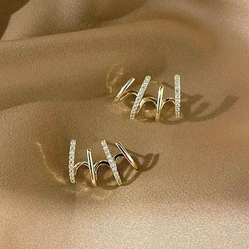 S925 silver needle four-prong zircon inlaid ear studs in gold finish, geometric shape, for women