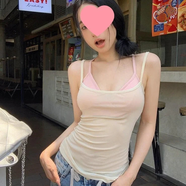 Short sleeveless see-through top in polyester fabric showing no back design