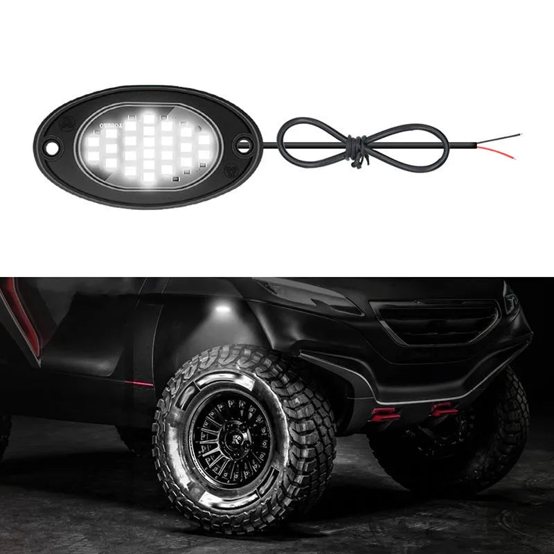12V car LED chassis ambience light in ABS housing with five colour options on a dark vehicle underside