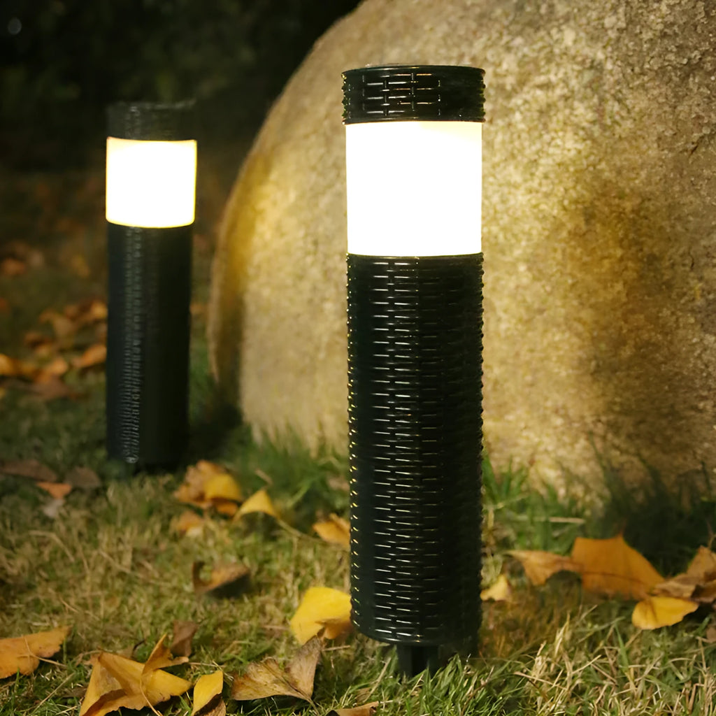 Solar-powered outdoor decorative garden light with abstract design and simulated flame effect