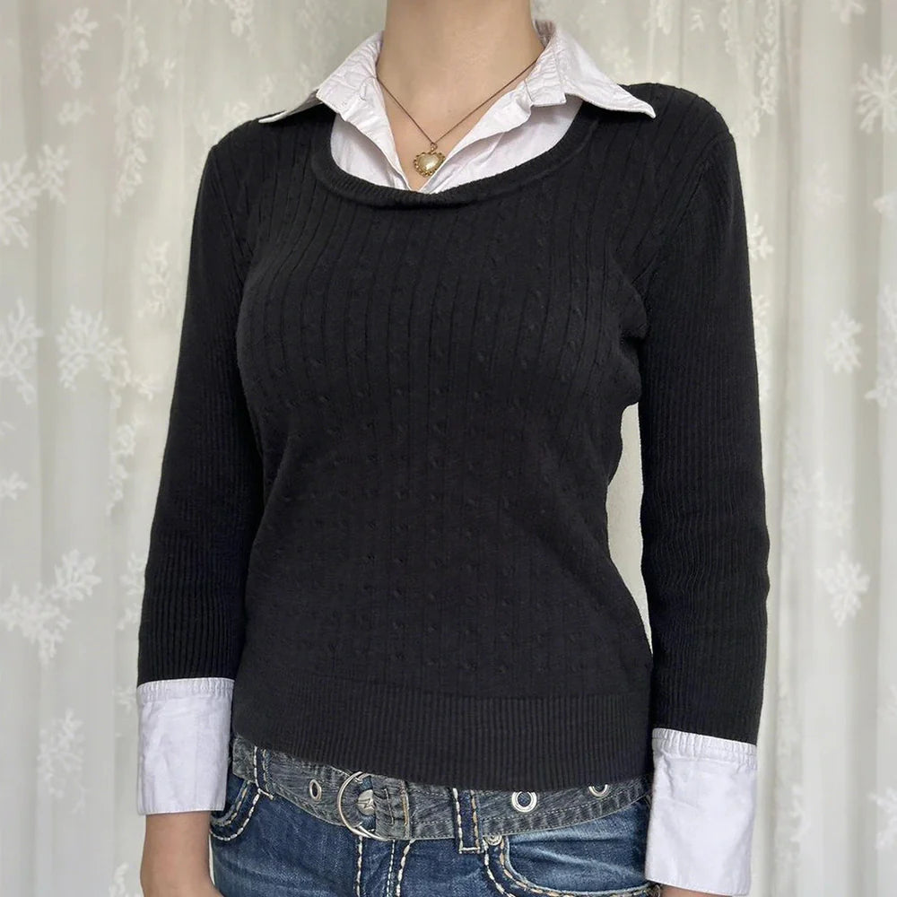 Black solid colour women's viscose pullover top showing front view with pullover styling