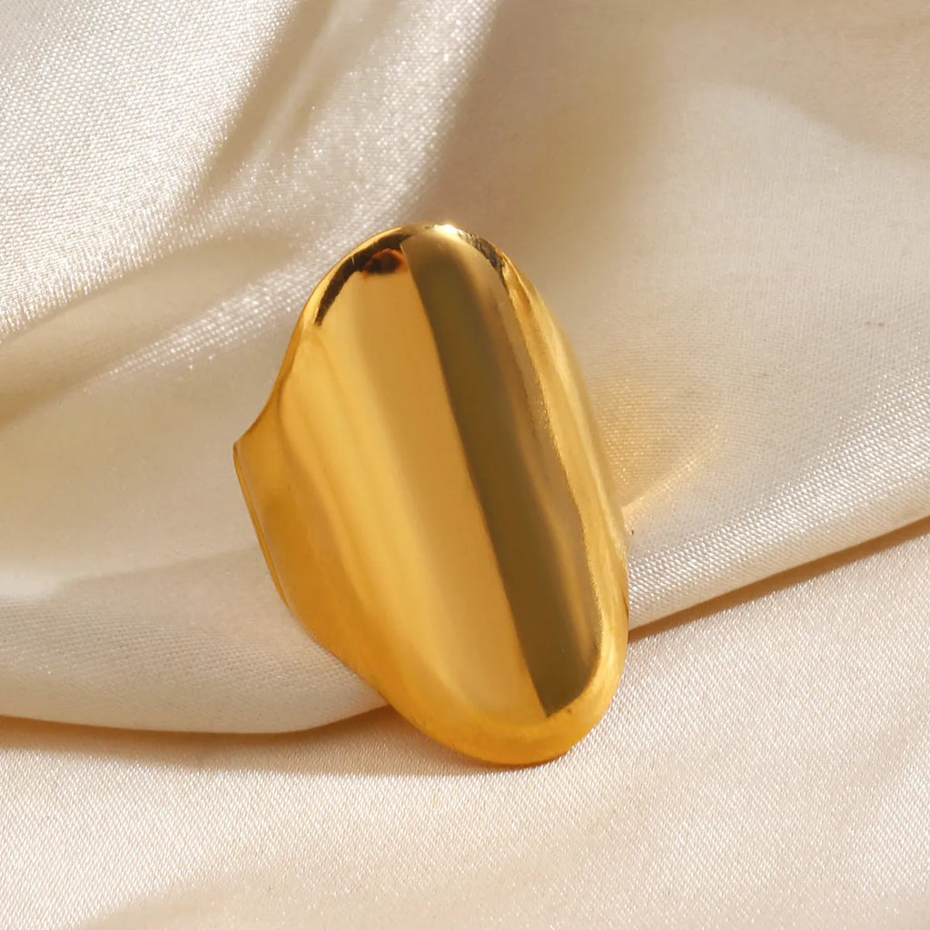 Exaggerated thick geometric stainless steel ring for women, available in gold and steel colour options