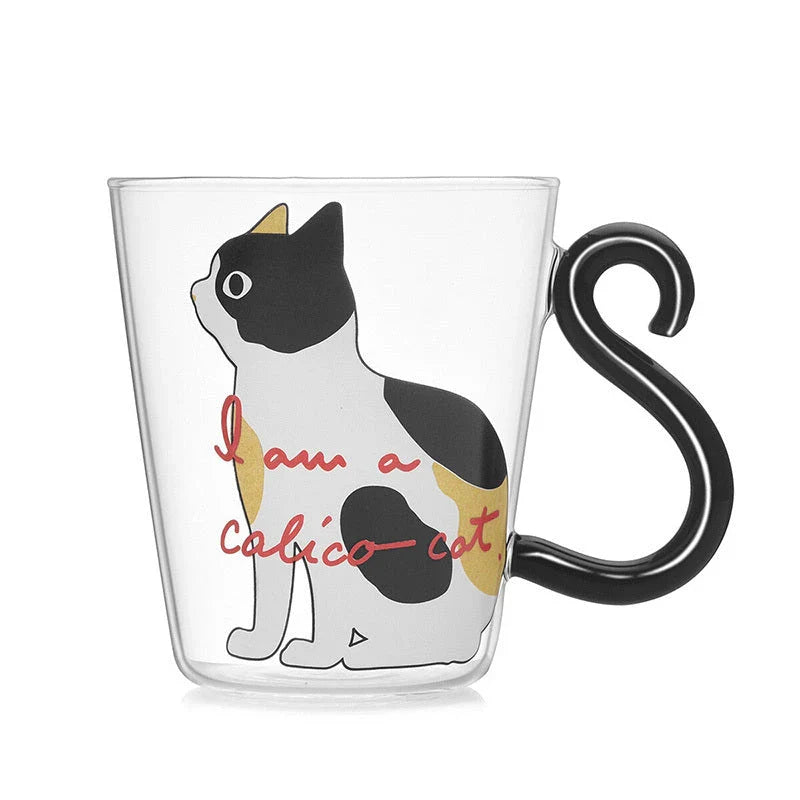 Adorable cat-themed glass mug with tail-shaped handle, perfect for hot and cold beverages