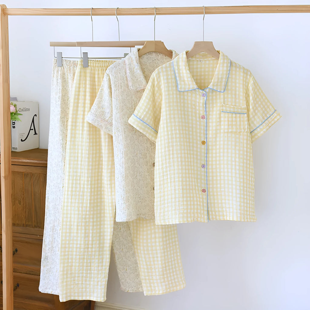 Women's loose-fit short-sleeved trousers and top in washed cotton gauze, shown in a floral or plaid pattern.
