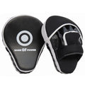 Red and black martial arts hand target kick pad for boxing and taekwondo training drills.
