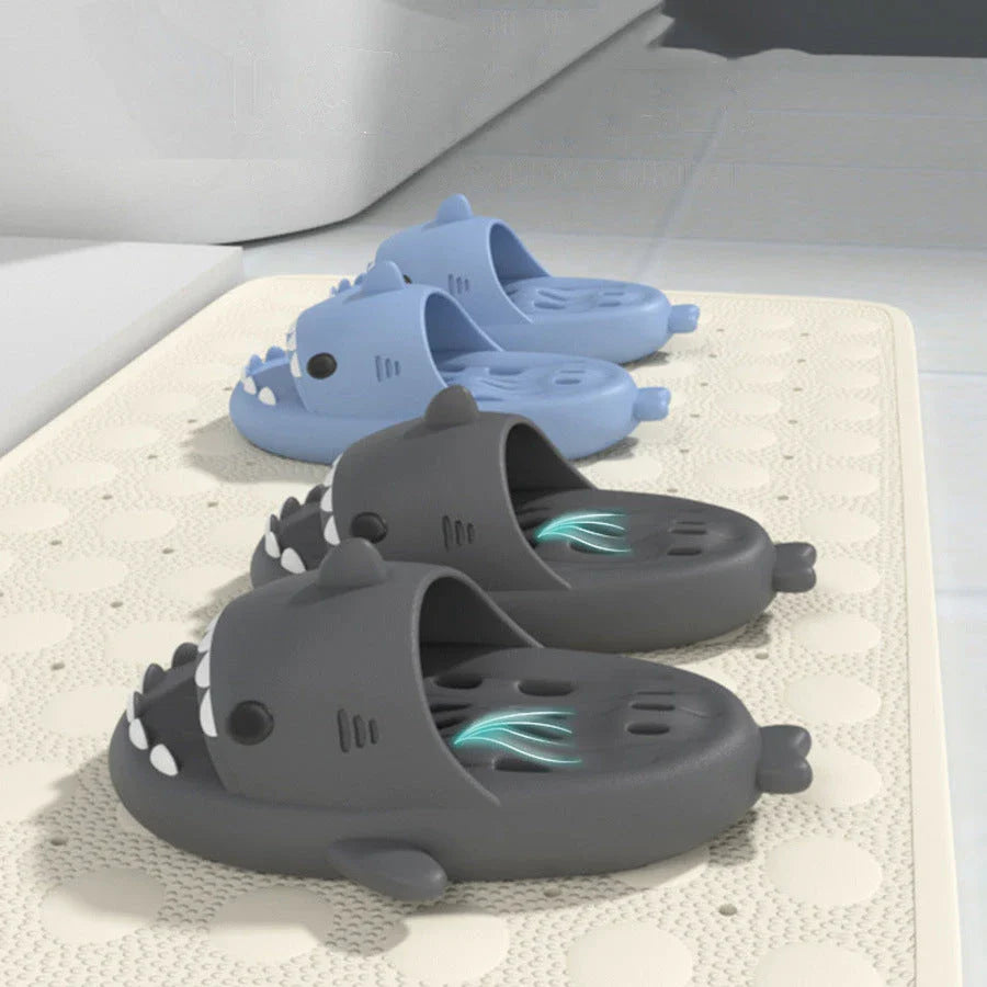 Shark-themed shower slides with drainage holes for women, featuring a realistic design, comfortable EVA material, and anti-slip features.