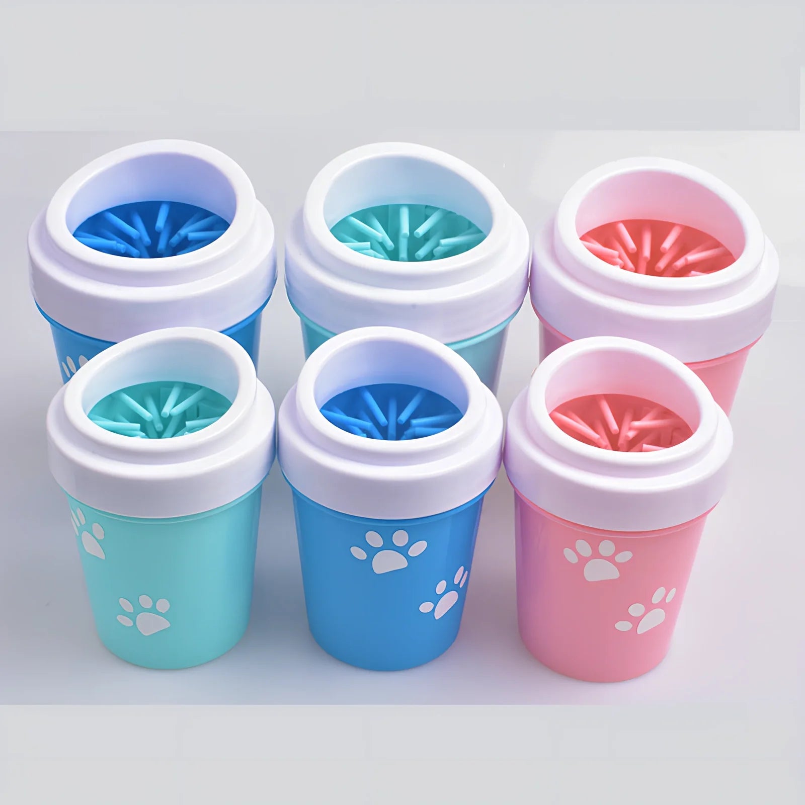 Blue silicone dog paw cleaning cup with soft bristles and stable base design