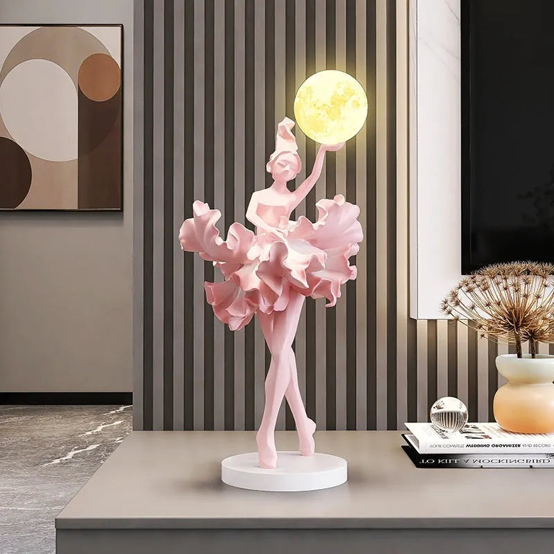 Resin ballet girl small night lamp in pink finish on tabletop