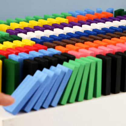 Wooden domino blocks set in 12 bright colours for educational play