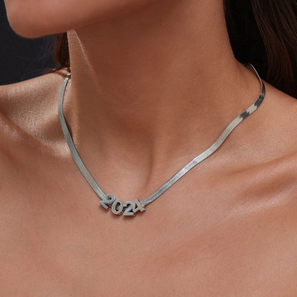 Gold titanium steel necklace with letter A charm on a 40.5cm blade chain