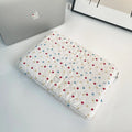 Women's polka dot polyester laptop bag shown in a solid colour, suitable for a 15.6 inch device.