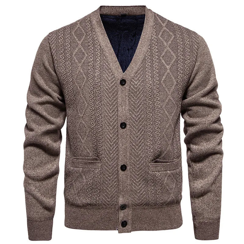 Man wearing a brown striped cardigan sweater with a wool lining, button front and long sleeves.