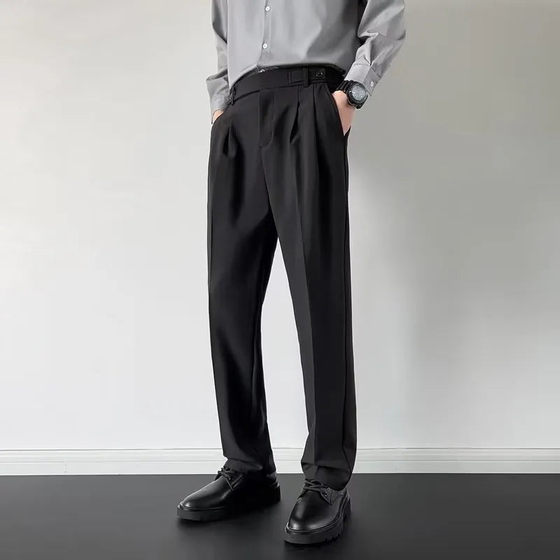 Men's straight-leg loose fit trousers in apricot colour on a hanger