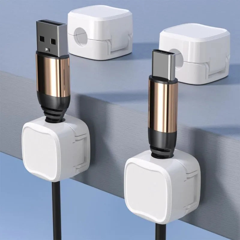 Black and white magnetic cable clips with adhesive backing for under desk wire organisation