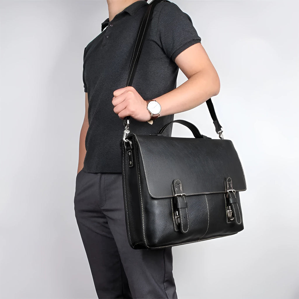 Men's retro brown leather business briefcase with adjustable shoulder strap, 38cm length, holds a 15.6-inch laptop.
