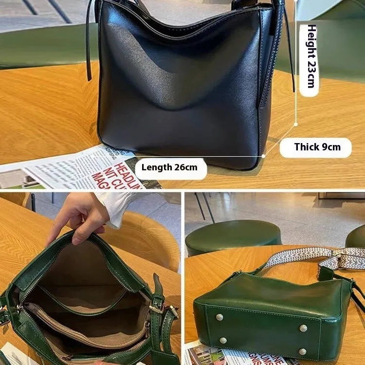 Women's black genuine leather messenger bag with multiple compartments and shoulder strap