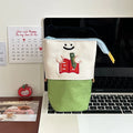 Brown collapsible Oxford fabric pencil case with large capacity, shown next to green version.