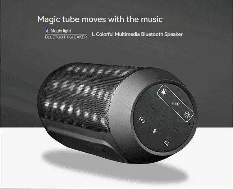 Black Bluetooth speaker with metal shell, colourful LED lights, and button controls on a desk