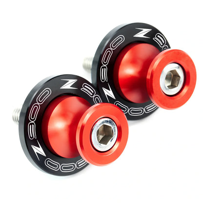 Pair of 8mm CNC aluminium swingarm spools sliders in titanium for Kawasaki Z650 Z900, with Delrin contact and stainless bolts