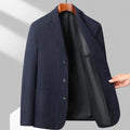 Men's solid colour loose fit wool blend coat for spring and autumn casual wear.