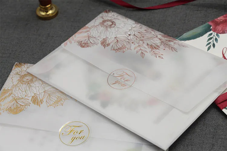 Gold and rose gold sulphuric acid paper invitation cards with bronzing matte varnish and sealing stickers