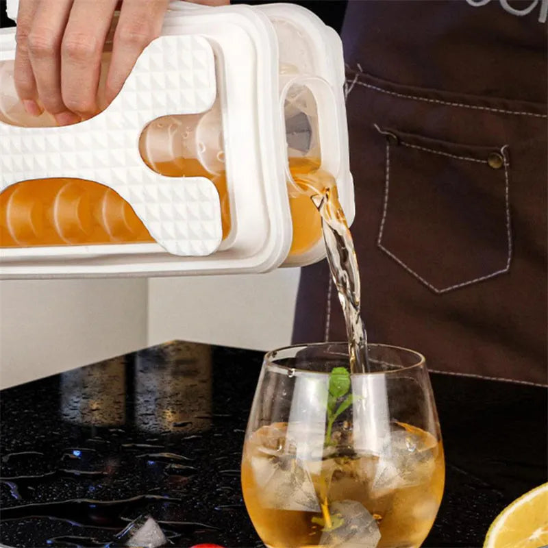 Silicone ice ball mould bottle in light grey, showing integrated ice tray and bottle with lid.