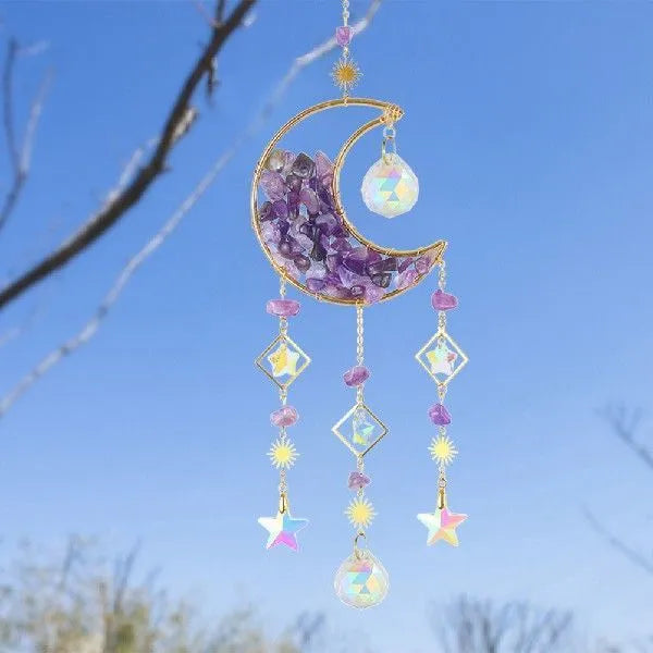Metal and K9 crystal moon pendant for car rearview mirror in blue.