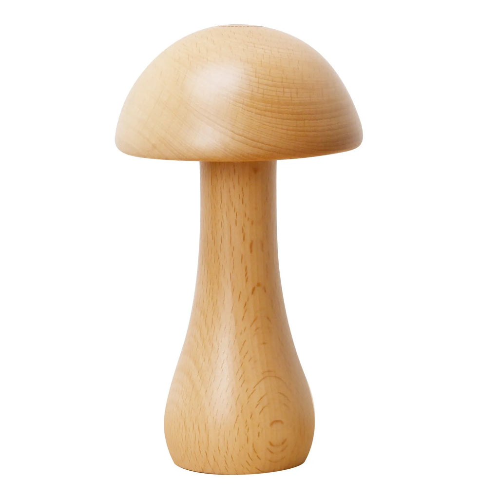Solid beech wood mushroom shaped LED bedside lamp with warm light on a wooden nightstand