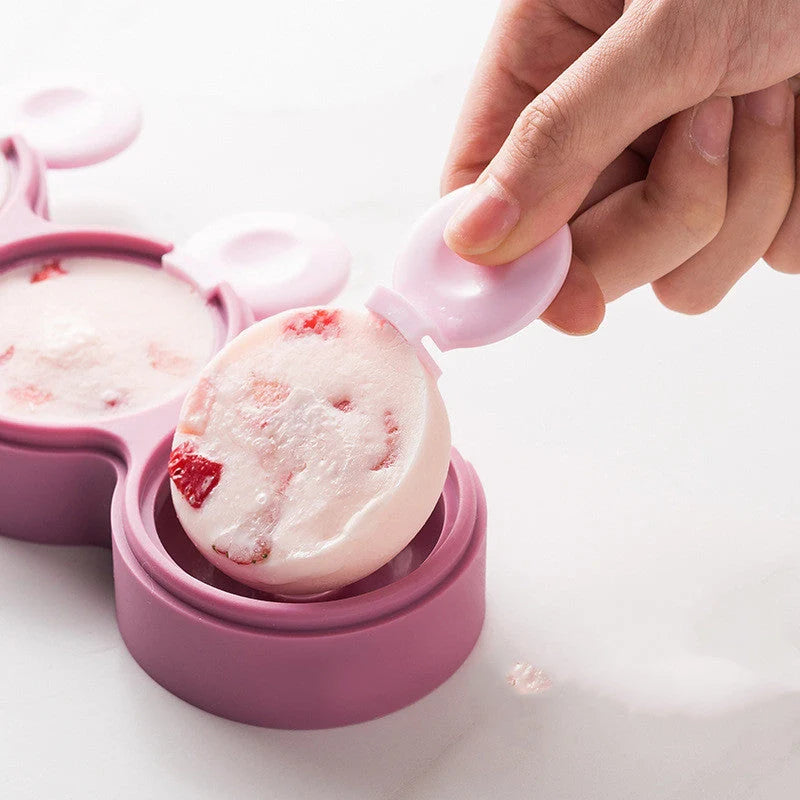 Zhixin Food Grade Silicone Doughnut Ice Cream Mold in yellow, green, and purple